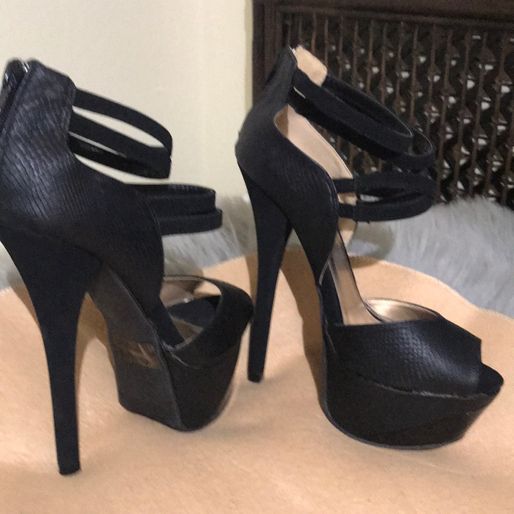 Charlotte Russe super High heel black sandals.